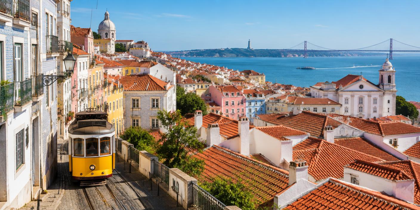 Lisbon rooftops and a yellow tram overlooking the Tagus